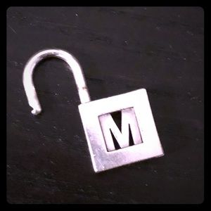 Tiffany & Co. “M” initial lock charm